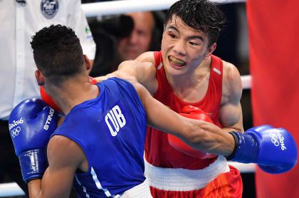 里约奥运会拳击男子52公斤级1/4决赛  中国选手胡建关晋级半决赛